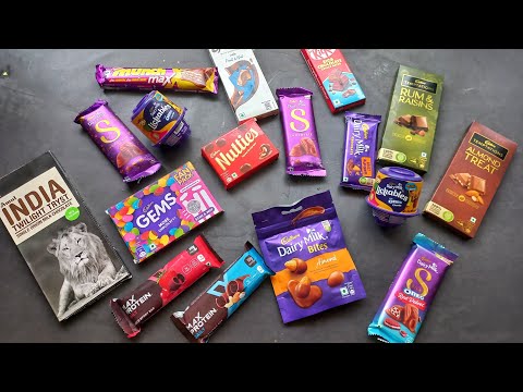 100 candies opening, chocolate a video, lots of chocolates, Cadbury celebration, surprise toys