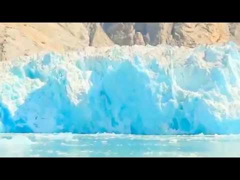 Massive Glacier Calving creating huge blue ice wall   Great event worth watching