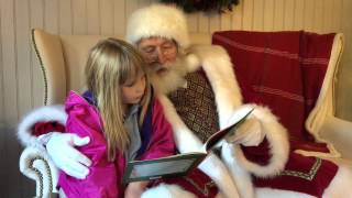 Opal Littleton reading Twas the Night Before Christmas with Santa