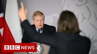UK PM Boris Johnson confronted by tearful Ukrainian journalist