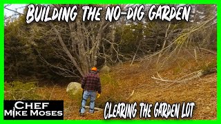 Building the No-Dig Garden by clearing the lot, burning the brush and making compost bins.