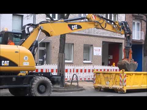 Bagger Caterpillar M316D mit Kastengreifer