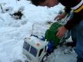 garbage truck toy in the snow 