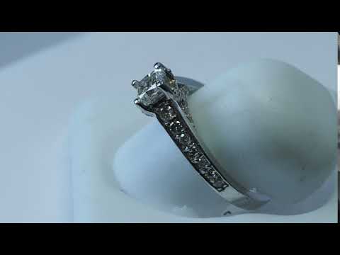 17. 14kt. Diamond (1.05ct) w/ Side Dia. (0.12ct) Ring