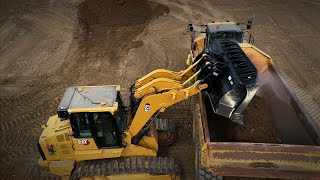 Pala de cadenas Cat® 973 | Excavación y carga de dúmper