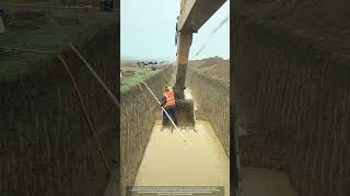 Ignoring Safety : Excavator Bucket Used for Measurements in Water Pipeline Trench