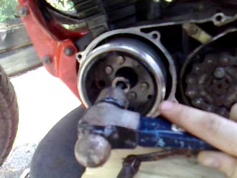 Remove flywheel/stator without special tools.