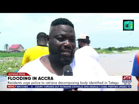 Flood in Accra: Residents urge police to retrieve decomposing body identified in Tetegu.