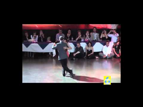  Sebastian Missé  and  Andrea Reyero  are  dancing  to  a  tango