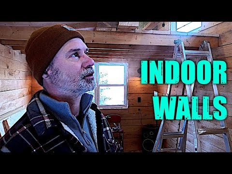 Finally, a cabin update. Interior walls with rough hemlock.