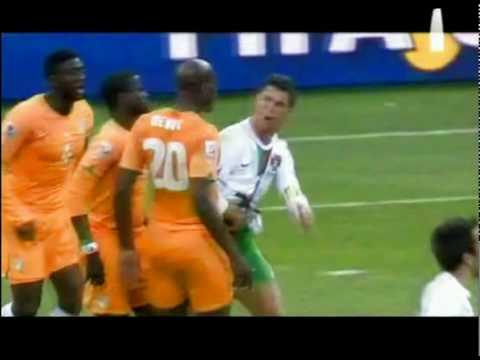 Guy Demel of Ivory Coast argues with Cristiano Ronaldo during the