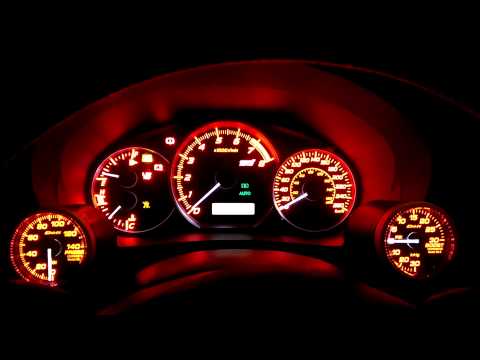 DEFI Red Racer Gauges with White Needle Pointers in 2011 Subaru STi