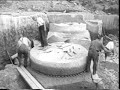 Herstellen eines Schleifsteins in der Sandsteingrube Chr. Hort