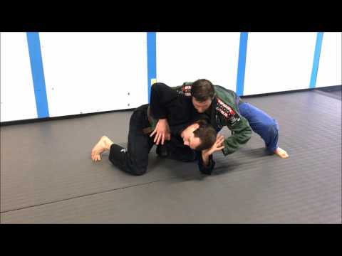 Escaping the turtle position in a fight or BJJ with a stand-up