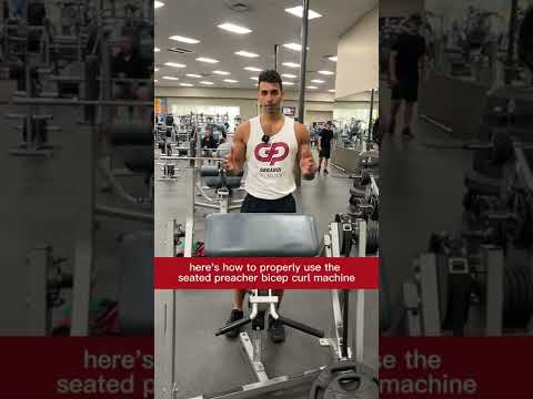 How to Properly Use The Seated Preacher Bicep Curl Machine With Good Form (Exercise Demonstration)