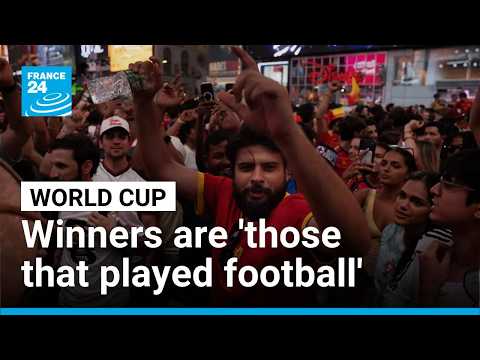 The winners are those 'that played football': Spanish fans celebrate World Cup win