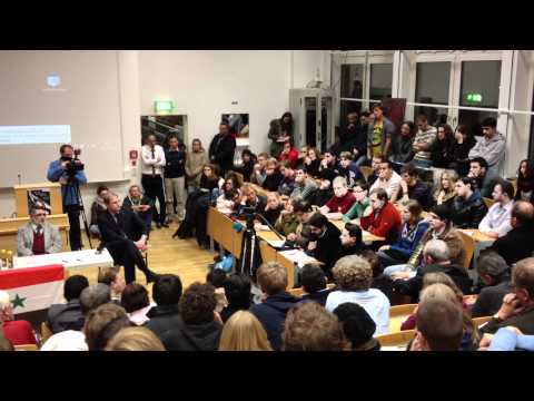 وليد القشعمي يروي قصة انشقاقه عن قوات النظام  أمام الجمهور الألماني في ندوة عن الثورة السورية