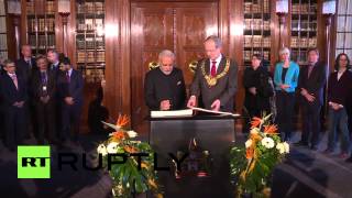 preview picture of video 'Germany: Modi signs 'Golden Book' at Hanover City Hall'