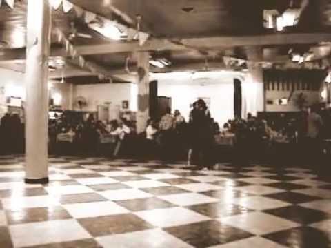  Andres Laza Moreno  and  Isabel Acuña  are  dancing  to  a  tango