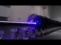 Pocket Blu-ray laser kills 100 black balloons in a...