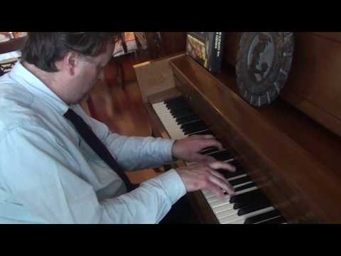 Maestro Valentin Radu playing few spontaneously samples at piano -1 of 2