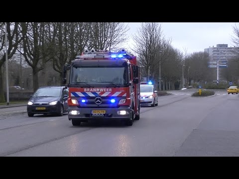 PRIO 1 TS 11-5034 en Politie met spoed naar de H. Meijerstraat in Purmerend