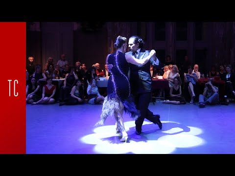  Mariana Montes  and  Sebastian Arce  are  dancing  to  a  nontraditional song  at  Antwerpen Tango Festival  in  2019