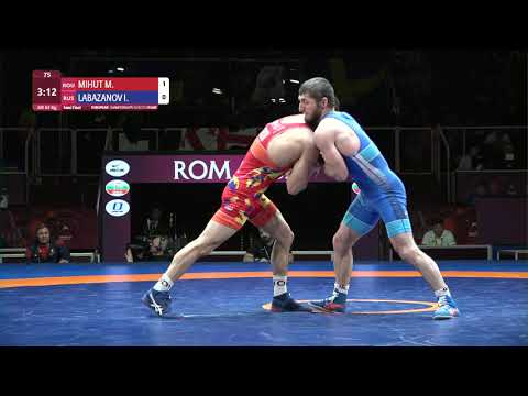 1/2 GR - 63 kg: M. MIHUT (ROU) v. I. LABAZANOV (RUS)