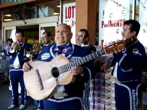 Mariachi Continental de Jesus Nunez sings 