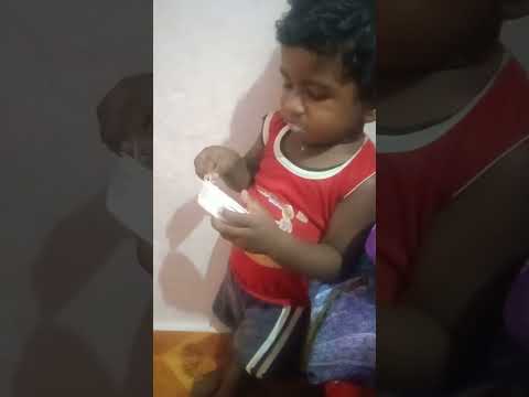 Godwin eats icecream