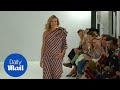 Arizona Muse flashes baby bump on London Fashion Week catwalk