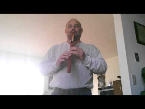 Playing my own music by tribal flute | by M.E. Felton II