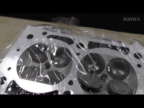 Red W124 projects cylinder head back from the machine shop - M104.980