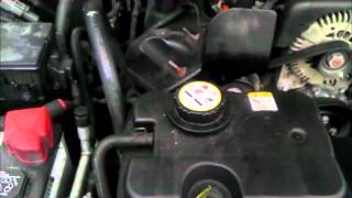 Coolant Flush and Thermostat Exchange on a Ford Panther Platform vehicle