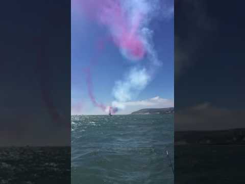 Red Arrows above a boat in Eastbourne