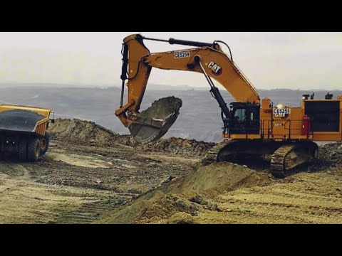 Caterpillar 6015B excavator sand loading truck