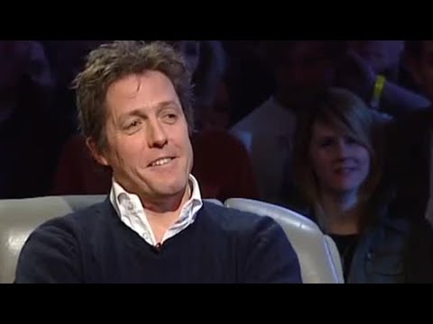 Hugh Grant Corrects Martin Brundle During Awkward F1 Gridwalk Interview