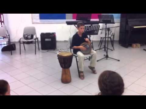 Aviel performs darbuka in music school concert