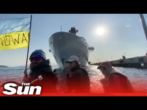 Ukraine protesters in a motor boat block Roman Abramovich's yacht from docking in Turkey