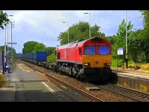 66704 with BIOMASS and 66149 on the BINLINER & four 150's.           Lostock Gralam, 23rd May 2020