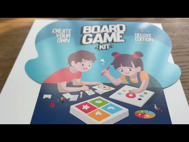 Vídeo relacionado con Apostrophe Games CREA tu Propio Juego de Mesa - Edición Deluxe - Kit de Bricolaje con Tablero de Juego en Blanco, Piezas de Juego, Cartas en Blanco, Dados, Ruleta - Versión en inglés