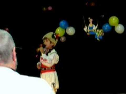 boy singing Bulgarian folk song