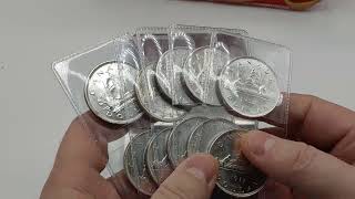 $1800 worth of Canadian Silver Dollars key dates unboxing amazing find and value