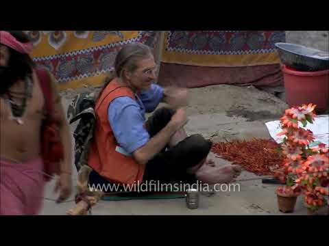 Sadhu Baba having tea with foreigner friend