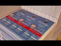 See video of die cutting door hangers.
