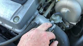Fixing a coolant leak in metal piping car engine. FORD BF II Ghia. Engine coolant find repair