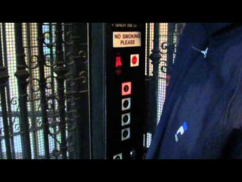 Elevator trio: Long cage elevator @ Le Chateau Village Frontenac MO