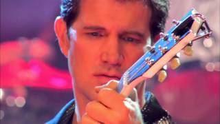 CHRIS ISAAK -  Live In Concert.  p. s . RAUL MALO