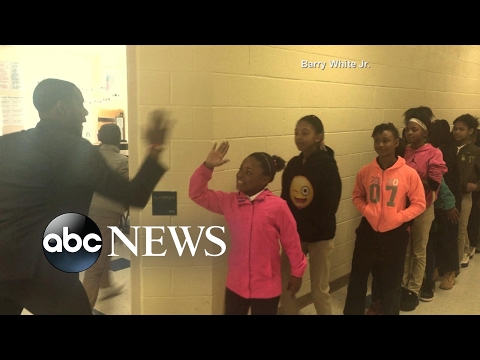 Videos - This teacher greets each of his students with a personalized check!