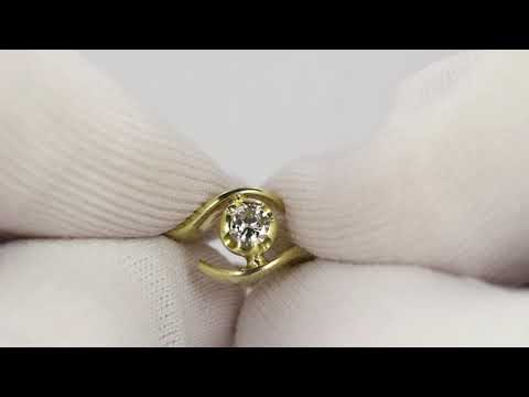 Anello vintage in oro 18k con diamante taglio brillante centrale (0.20 ct),  anni 70.